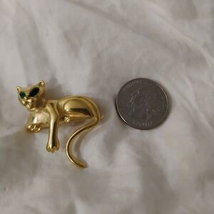 Elegant Gold Cat Brooch with Green Eyes